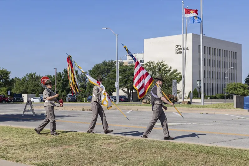 Fort Sill Soldiers march with a color guard in the Armed Forces Day parade in Lawton, Oklahoma. U.S. Army photo via DVIDS.